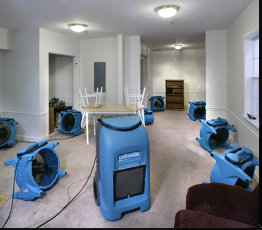 Air movers and dehumidifier setup for Water Extraction & Removal in Rawlins
